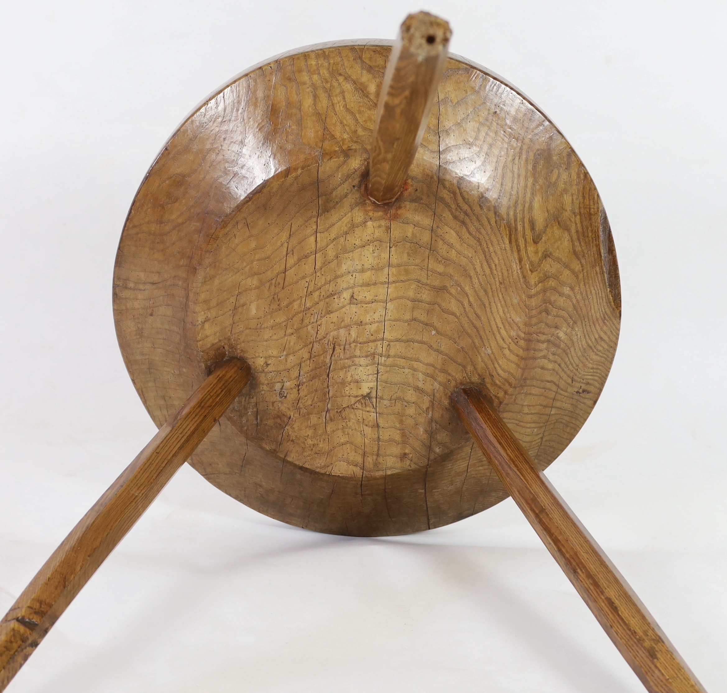 A 19th century circular ash cricket table, diameter 65cm, height 63cm